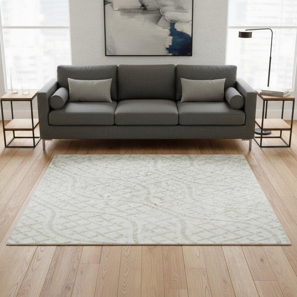 HomeRoots 5' X 8' Ivory And Beige Geometric Area Rug - Washable, Stain Resistant, UV Protected for All Spaces 673635