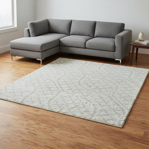 HomeRoots 8' X 10' Ivory and Beige Geometric Area Rug - Washable, Stain-Resistant, UV Protected for Durable Style 673637