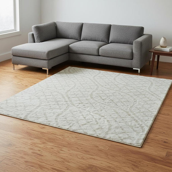 HomeRoots 8' X 10' Ivory and Beige Geometric Area Rug - Washable, Stain-Resistant, UV Protected for Durable Style 673637