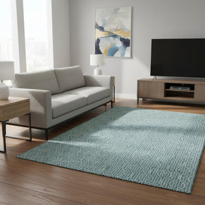 HomeRoots 5' X 8' Teal and Ivory Geometric Area Rug – Stylish, Washable, UV-Protected for High-Traffic Spaces! 673671