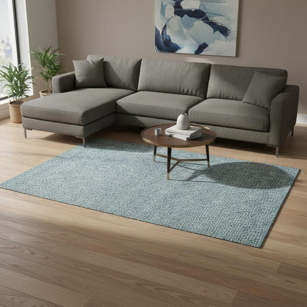 HomeRoots 9' X 12' Teal and Ivory Geometric Area Rug - Washable, UV Protected, Durable for Busy Homes & Pets 673674
