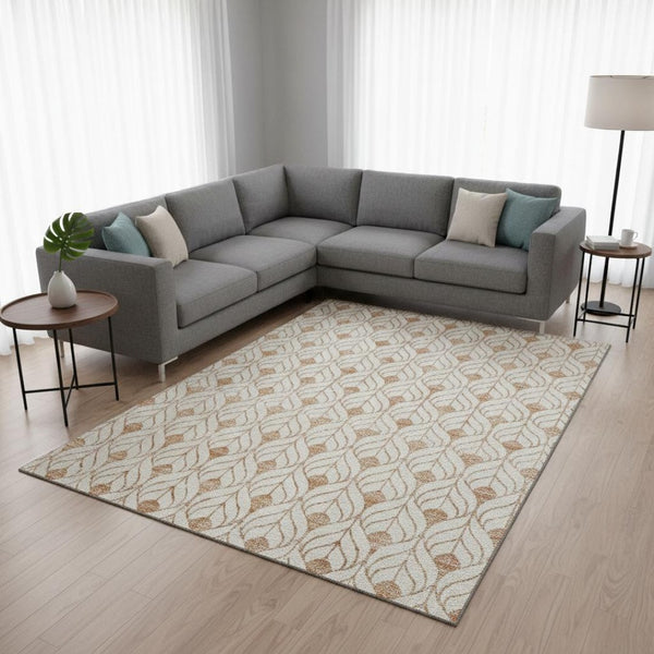 HomeRoots 10' X 14' Salmon and Ivory Geometric Area Rug - Washable, UV Protected, Ideal for High-Traffic Spaces 673747