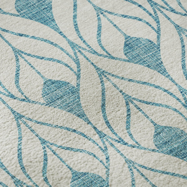 HomeRoots 8' Teal and Ivory Geometric Round Rug - Washable, UV-Protected, Perfect for High-Traffic Areas! 673756