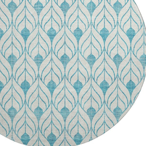 HomeRoots 8' Teal and Ivory Geometric Round Rug - Washable, UV-Protected, Perfect for High-Traffic Areas! 673756