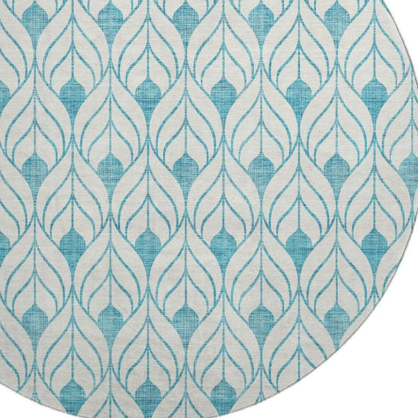 HomeRoots 8' Teal and Ivory Geometric Round Rug - Washable, UV-Protected, Perfect for High-Traffic Areas! 673756