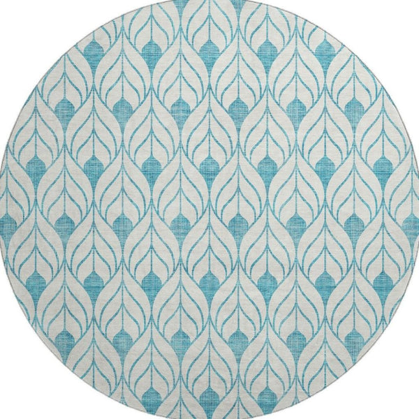 HomeRoots 8' Teal and Ivory Geometric Round Rug - Washable, UV-Protected, Perfect for High-Traffic Areas! 673756