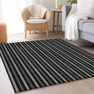 HomeRoots 5' X 8' Black And Ivory Striped Area Rug - Stylish, Washable, UV-Protected, Perfect for Any Room! 673827