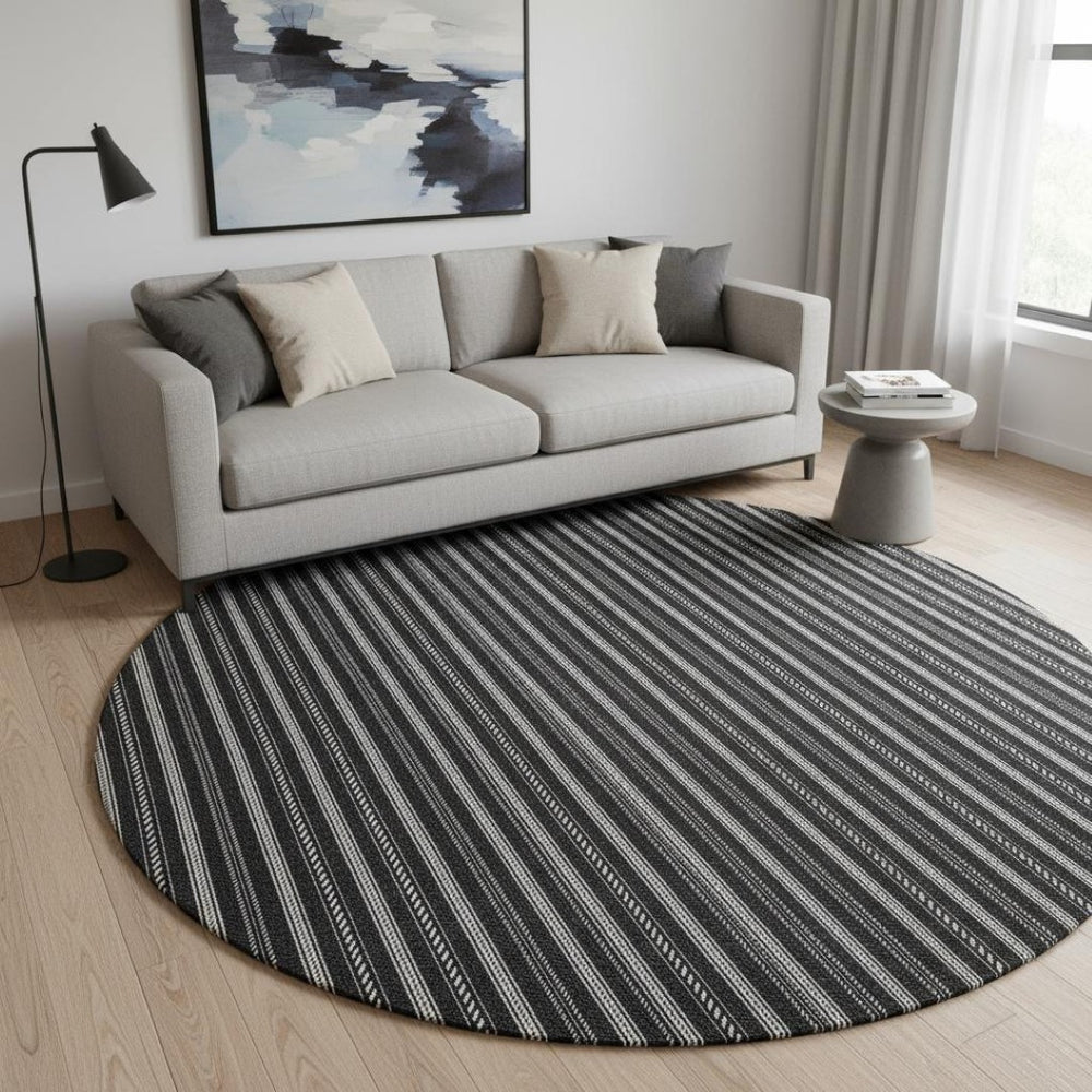 HomeRoots 8' Black And Ivory Striped Round Rug - Washable, UV-Protected, Durable Design for High-Traffic Areas 673828