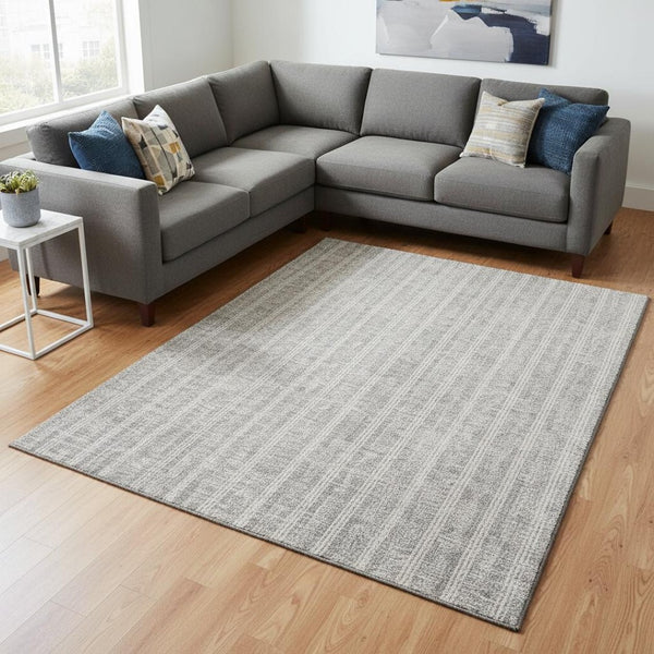 HomeRoots 9' X 12' Stylish Silver & Ivory Striped Washable Area Rug with UV Protection for Modern Homes 673878
