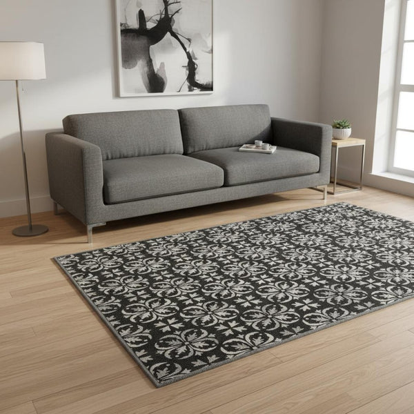 HomeRoots 5' X 8' Black and Ivory Floral Area Rug - Washable, Durable, UV-Protected for Everyday Elegance 673905