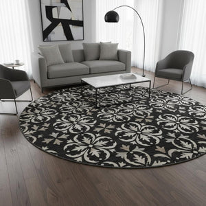 HomeRoots 8' Elegant Black and Ivory Floral Round Rug - Washable, UV Protected, Durable for Indoor & Outdoor Use 673906