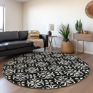 HomeRoots 8' Elegant Black and Ivory Floral Round Rug - Washable, UV Protected, Durable for Indoor & Outdoor Use 673906