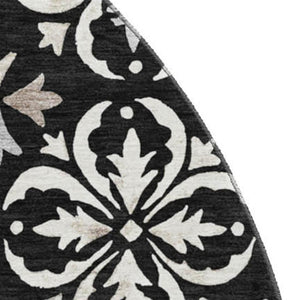HomeRoots 8' Elegant Black and Ivory Floral Round Rug - Washable, UV Protected, Durable for Indoor & Outdoor Use 673906