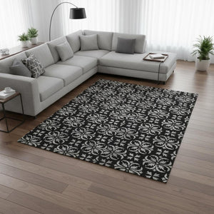 HomeRoots 8' X 10' Black And Ivory Floral Area Rug - Stylish, Washable, UV-Protected for High-Traffic Spaces 673907