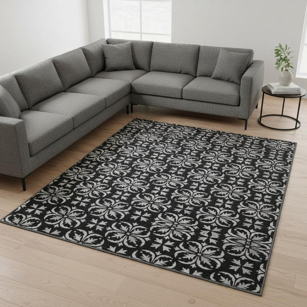 HomeRoots 9' X 12' Black And Ivory Floral Area Rug – Stylish, Washable, UV Protected, Perfect for Family Spaces! 673908
