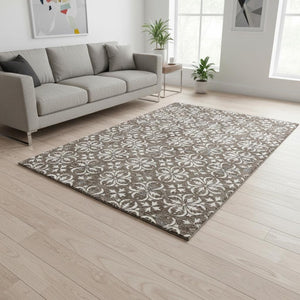HomeRoots 5' X 8' Brown and Ivory Floral Area Rug – Washable, Stain-Resistant, UV Protected for Everyday Elegance 673911