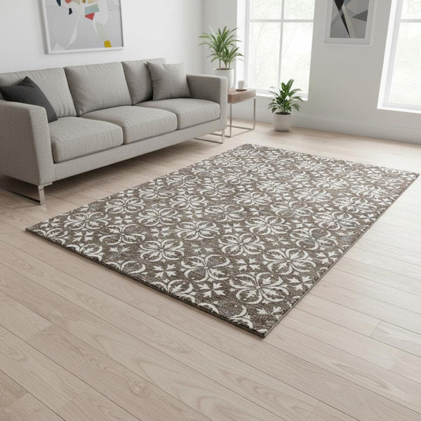 HomeRoots 5' X 8' Brown and Ivory Floral Area Rug – Washable, Stain-Resistant, UV Protected for Everyday Elegance 673911