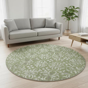 HomeRoots 8' Green and Ivory Floral Round Rug - Washable, UV Protected, Ideal for High-Traffic Areas & Kids 673936