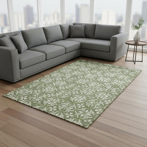 HomeRoots 10' X 14' Green And Ivory Floral Area Rug - Washable, Stain-Resistant, UV Protected for High-Traffic Spaces 673939
