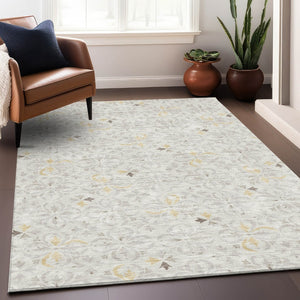 HomeRoots 5' X 8' Ivory and Beige Floral Washable Area Rug - Durable, UV-Protected, Stain-Resistant Design 673941