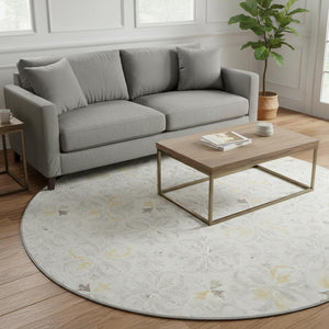 HomeRoots 8' Ivory and Beige Floral Washable Round Rug - Durable, UV-Protected, Stain-Resistant Elegance 673942