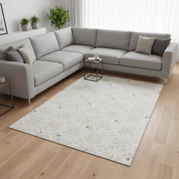 HomeRoots 8' X 10' Ivory and Beige Floral Washable Area Rug - Durable, UV Protected, Perfect for High-Traffic Homes 673943