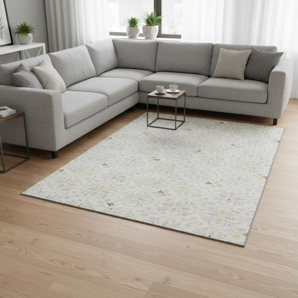 HomeRoots 10' X 14' Ivory and Beige Floral Area Rug - Durable, Washable, UV-Protected Elegance for High Traffic 673945
