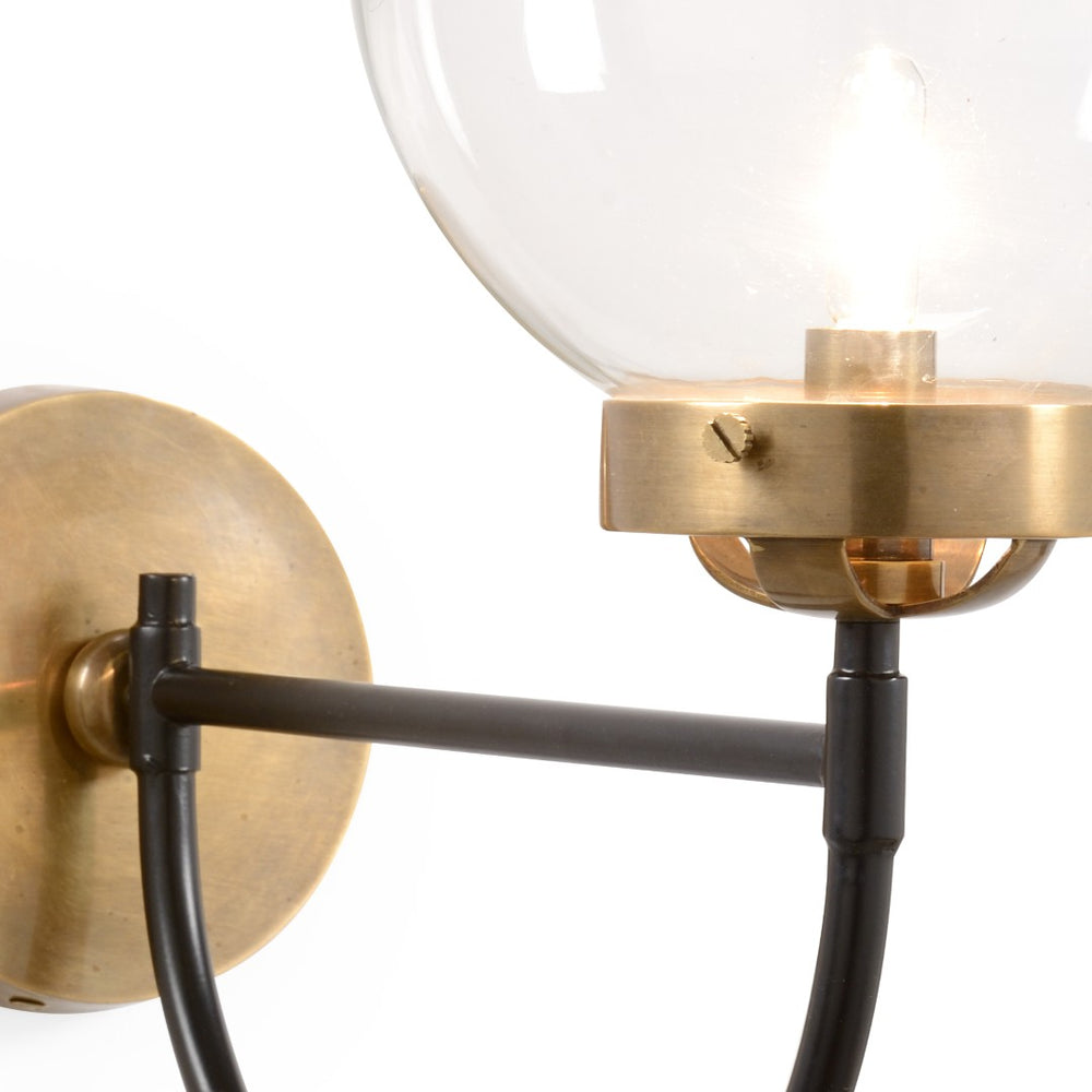 Wildwood Bistro Two-Tone Mid-Century Wall Sconce With Clear Glass Globe, Brass & Matte Black Finish, 16" 67396