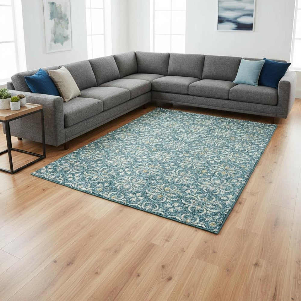HomeRoots 8' X 10' Teal & Ivory Floral Area Rug - Washable, UV Protected, Ideal for Families & Pets! 673973