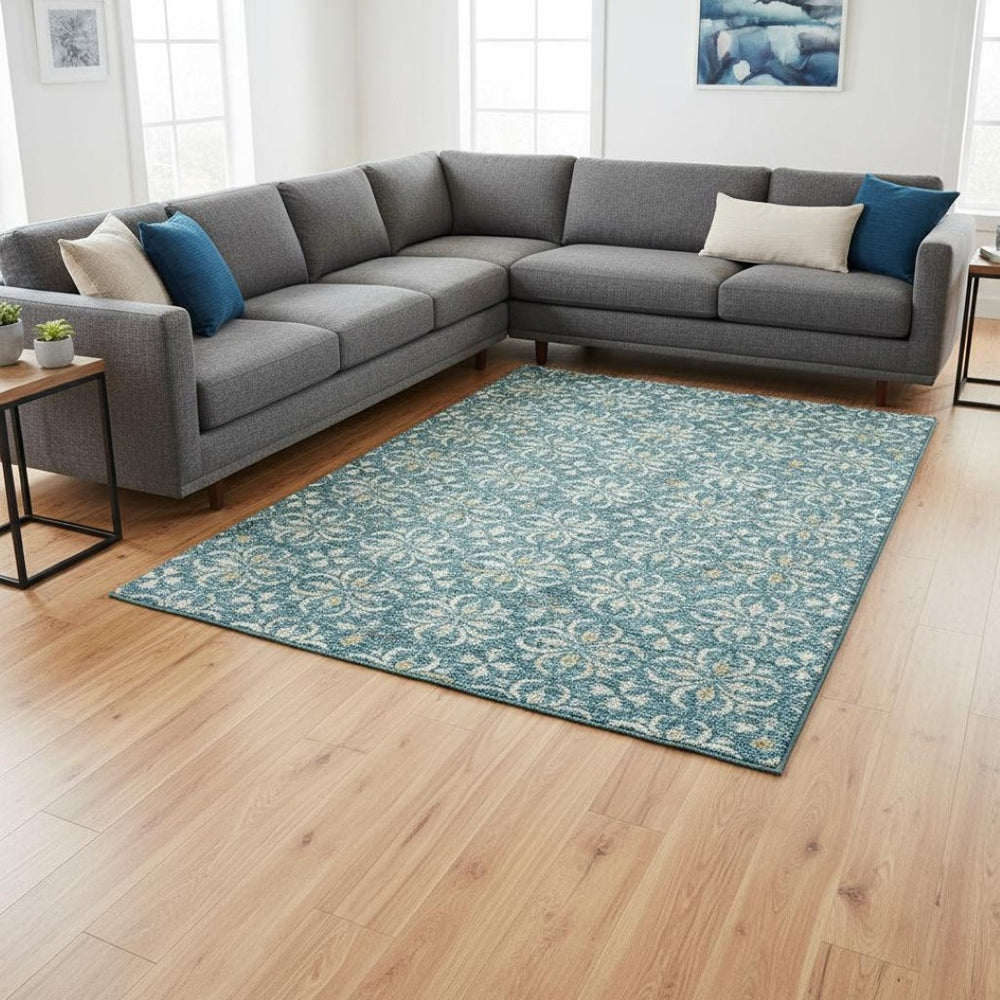 HomeRoots 9' X 12' Teal Floral Area Rug - Washable, UV Protected, Stain Resistant, Perfect for High-Traffic Spaces 673974