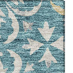 HomeRoots 9' X 12' Teal Floral Area Rug - Washable, UV Protected, Stain Resistant, Perfect for High-Traffic Spaces 673974