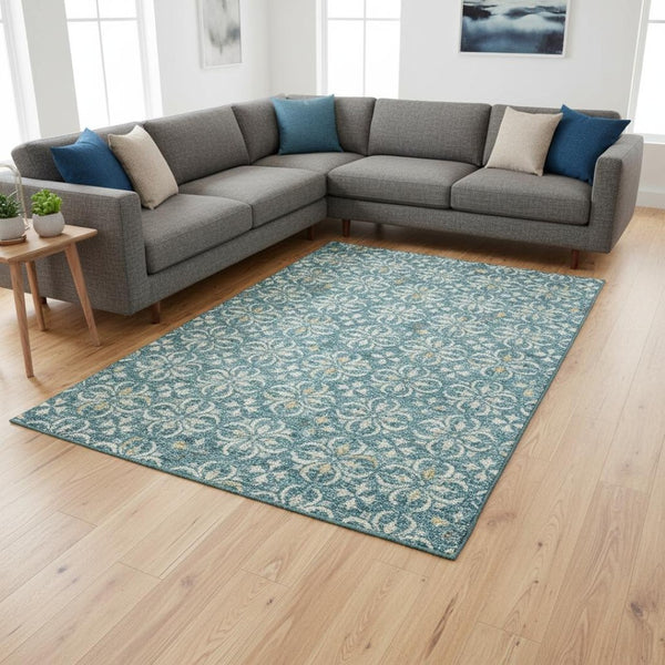 HomeRoots 10' Teal and Ivory Floral Area Rug - Washable, UV-Protected, Durable Design for Elegant Living Spaces 673975