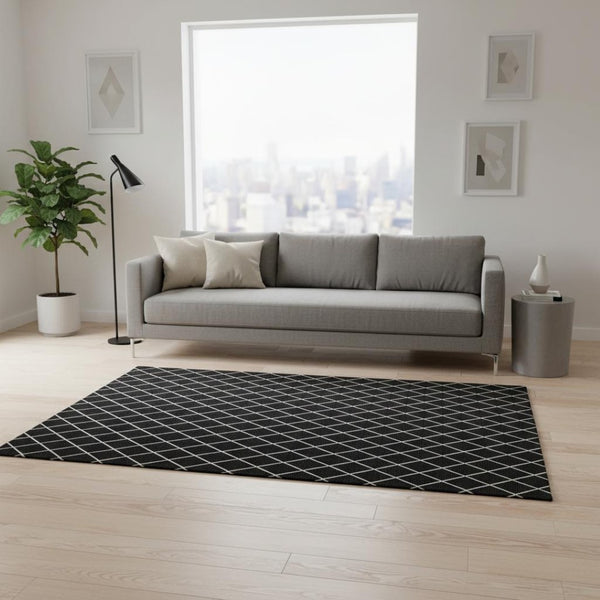 HomeRoots 5' X 8' Black And Ivory Geometric Area Rug – Stylish, Washable, UV-Protected for Busy Homes & Pets 674061