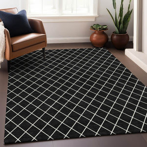 HomeRoots 10' X 14' Stylish Black and Ivory Geometric Washable Area Rug with UV Protection for Modern Living 674065