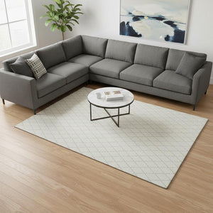 HomeRoots 9' x 12' Stylish Ivory and Beige Geometric Area Rug - Washable, UV-Protected, Family-Friendly Design! 674094