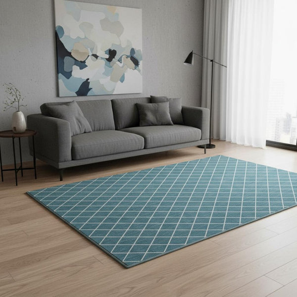 HomeRoots 5' X 8' Stylish Teal And Ivory Geometric Washable Area Rug With UV Protection For High-Traffic Areas 674127