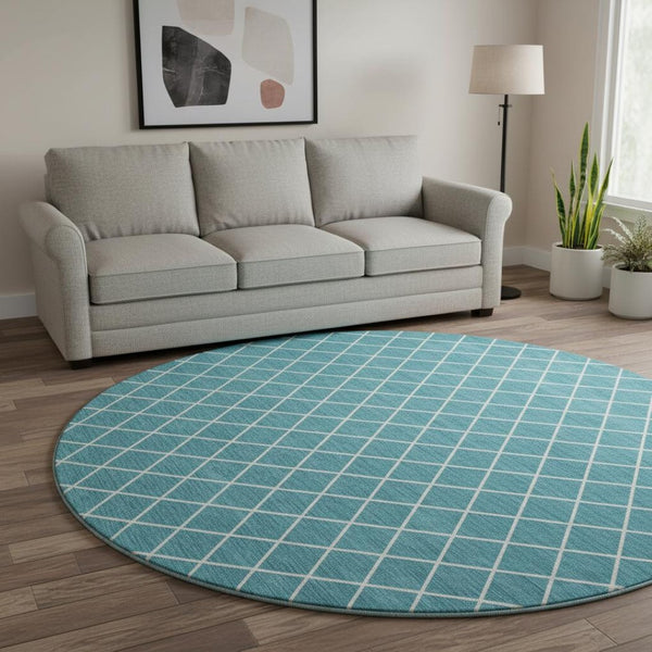 HomeRoots 8' Teal And Ivory Geometric Round Rug – Stylish, Washable, UV-Protected for High-Traffic Spaces! 674128