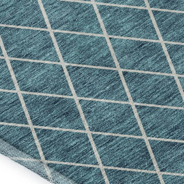 HomeRoots 10' Teal and Ivory Geometric Washable Area Rug with UV Protection for Stylish, High-Traffic Spaces 674131