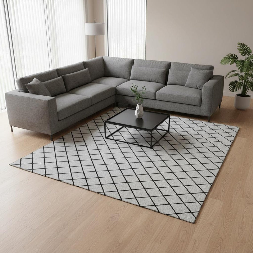 HomeRoots 8' X 10' Stylish White and Black Geometric Washable Area Rug with UV Protection for Modern Homes 674135