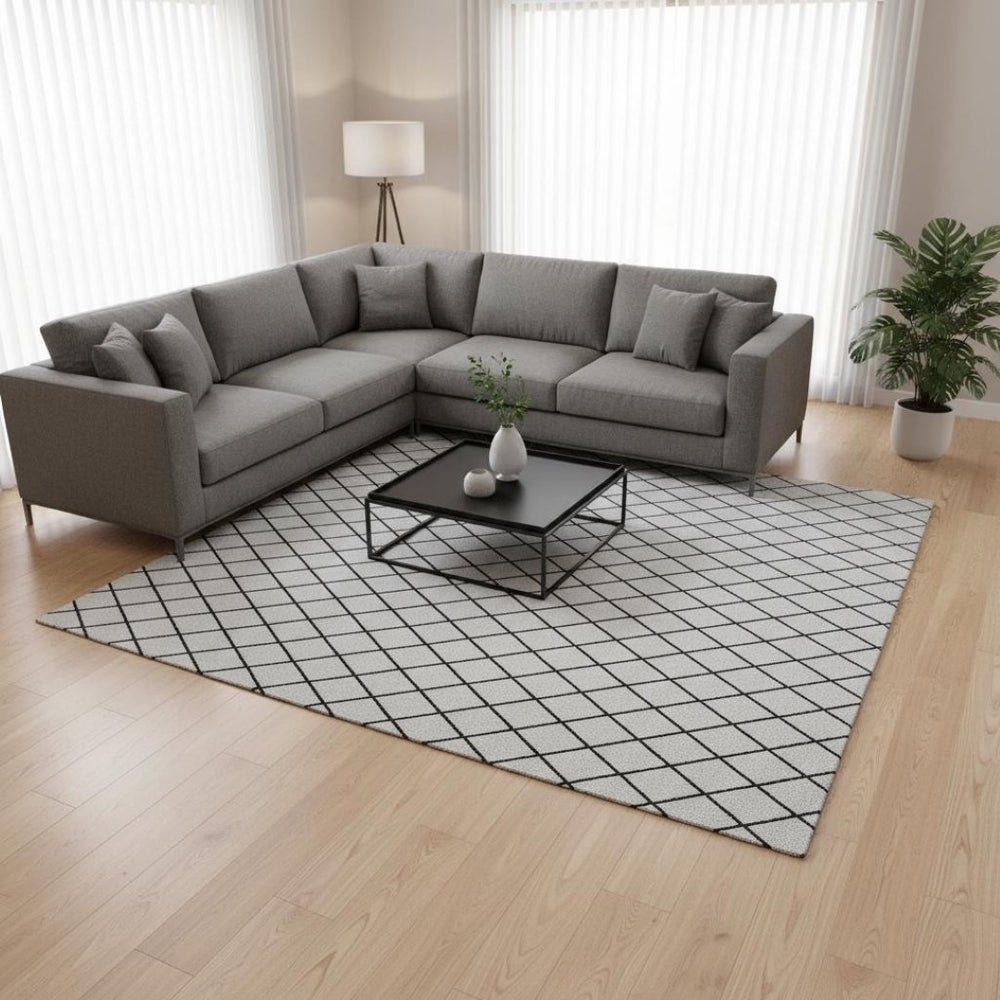 HomeRoots 10' X 14' Modern White and Black Geometric Washable Area Rug with UV Protection for Homes 674137
