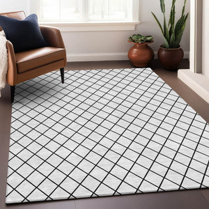 HomeRoots 10' X 14' Modern White and Black Geometric Washable Area Rug with UV Protection for Homes 674137