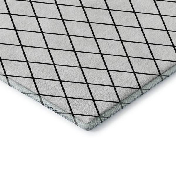 HomeRoots 10' X 14' Modern White and Black Geometric Washable Area Rug with UV Protection for Homes 674137