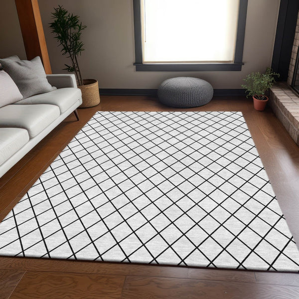 HomeRoots 10' X 14' Modern White and Black Geometric Washable Area Rug with UV Protection for Homes 674137