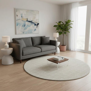 HomeRoots 8' Beige and Ivory Geometric Round Rug - Washable, UV-Protected, Stylish, and Durable for Any Room! 674140