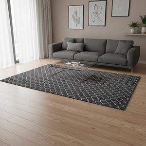 HomeRoots 5' X 8' Black And Ivory Geometric Area Rug – Washable, UV-Protected, Perfect for High-Traffic Spaces! 674145