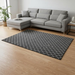 HomeRoots 9' X 12' Black and Ivory Geometric Area Rug - Washable, UV-Protected, Stylish for High-Traffic Areas 674148