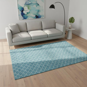 HomeRoots 5' X 8' Teal & Ivory Geometric Area Rug - Washable, UV-Protected, Durable for High-Traffic Spaces 674193
