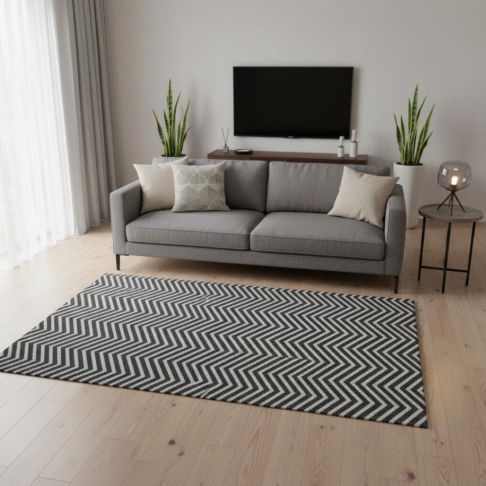 HomeRoots 5' X 8' Black And Ivory Chevron Area Rug – Washable, UV-Protected, Stain-Resistant, Stylish Design! 674223