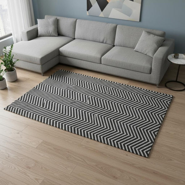 HomeRoots 8' X 10' Black And Ivory Chevron Area Rug - Stylish, Washable, UV-Protected & Perfect for Busy Homes 674225