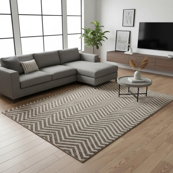 HomeRoots 10' X 14' Brown And Beige Chevron Area Rug - Washable, UV-Protected, Perfect for High-Traffic Spaces! 674239